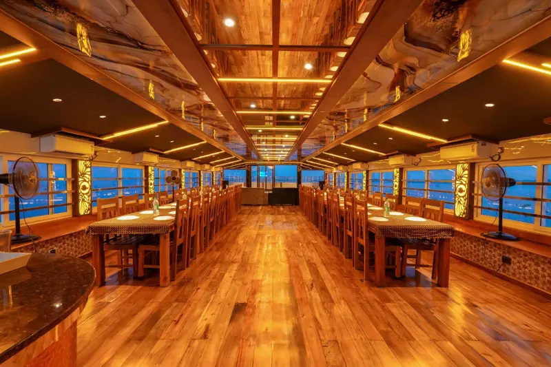 Long dining hall set for a group dinner