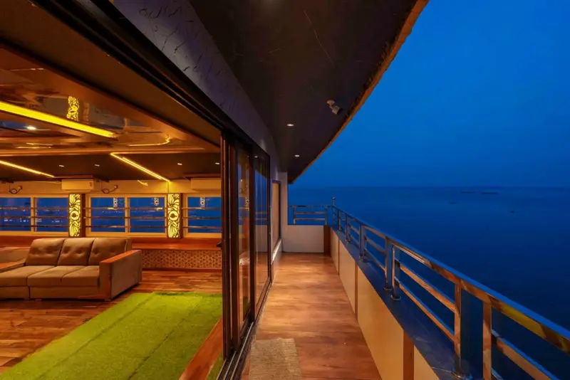 Balcony deck at dusk over Vembanad Lake